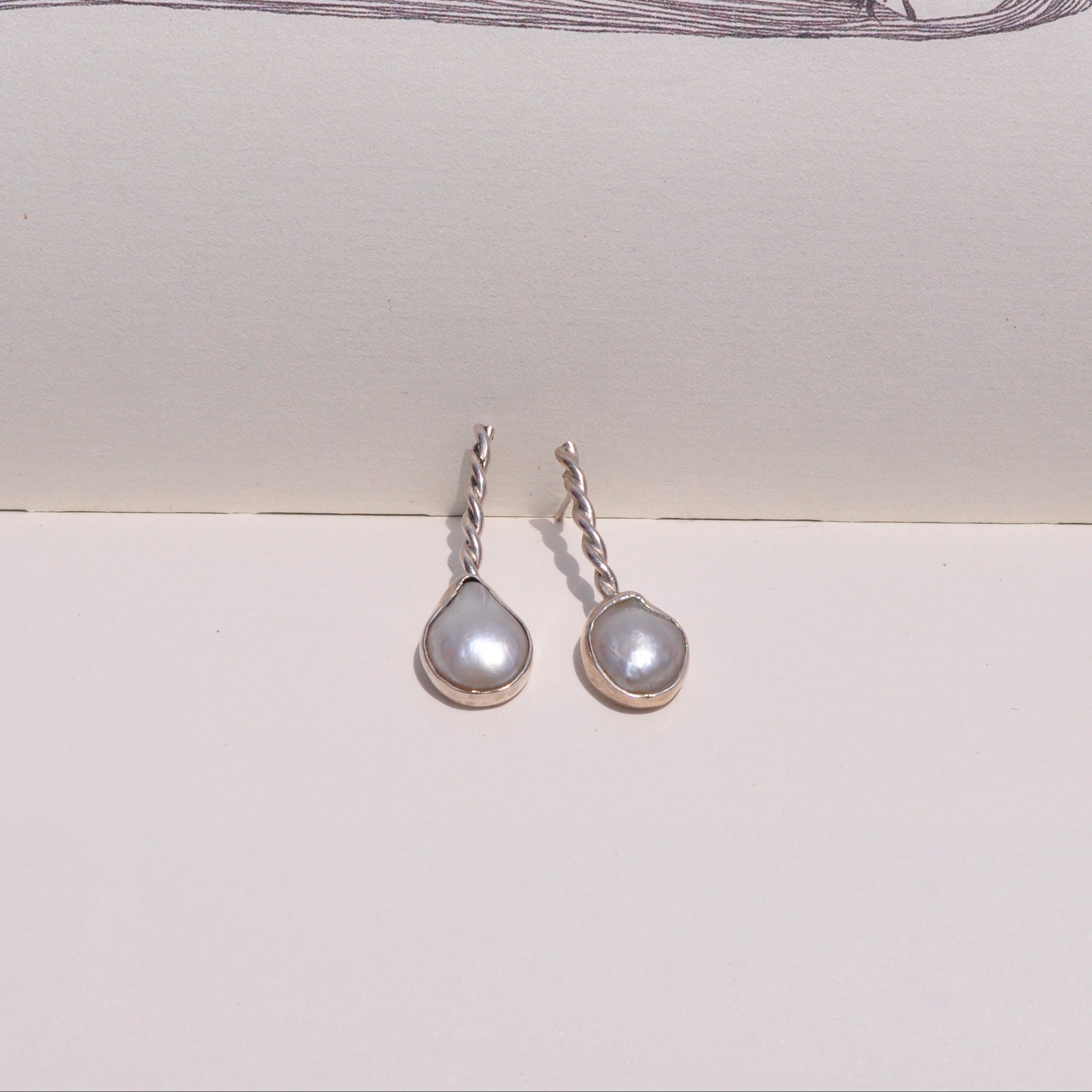 Aretes perla
