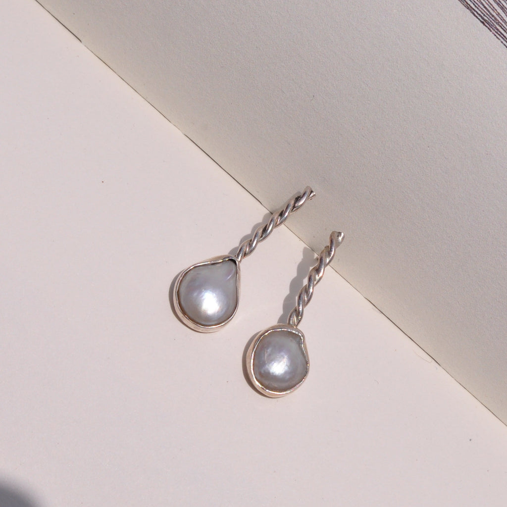 Aretes perla