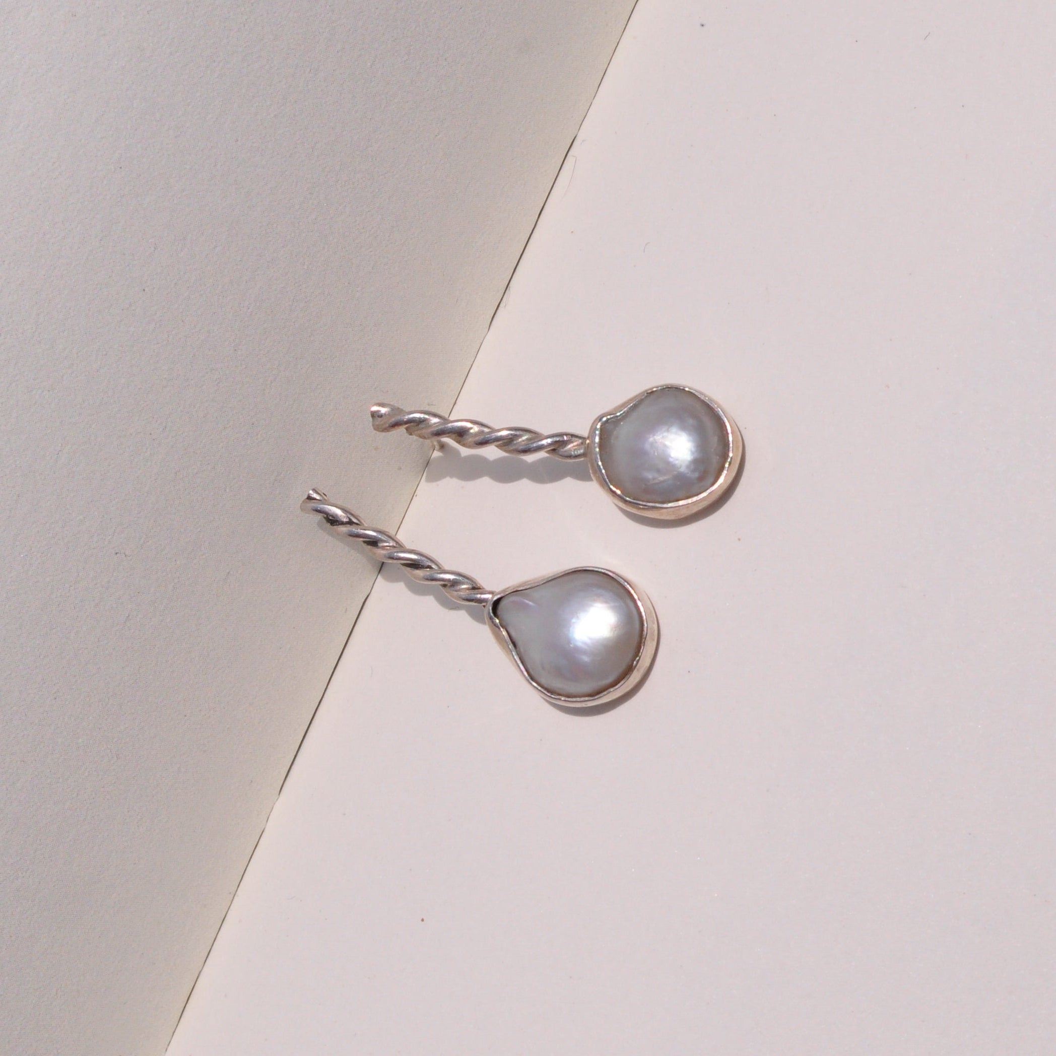 Aretes perla