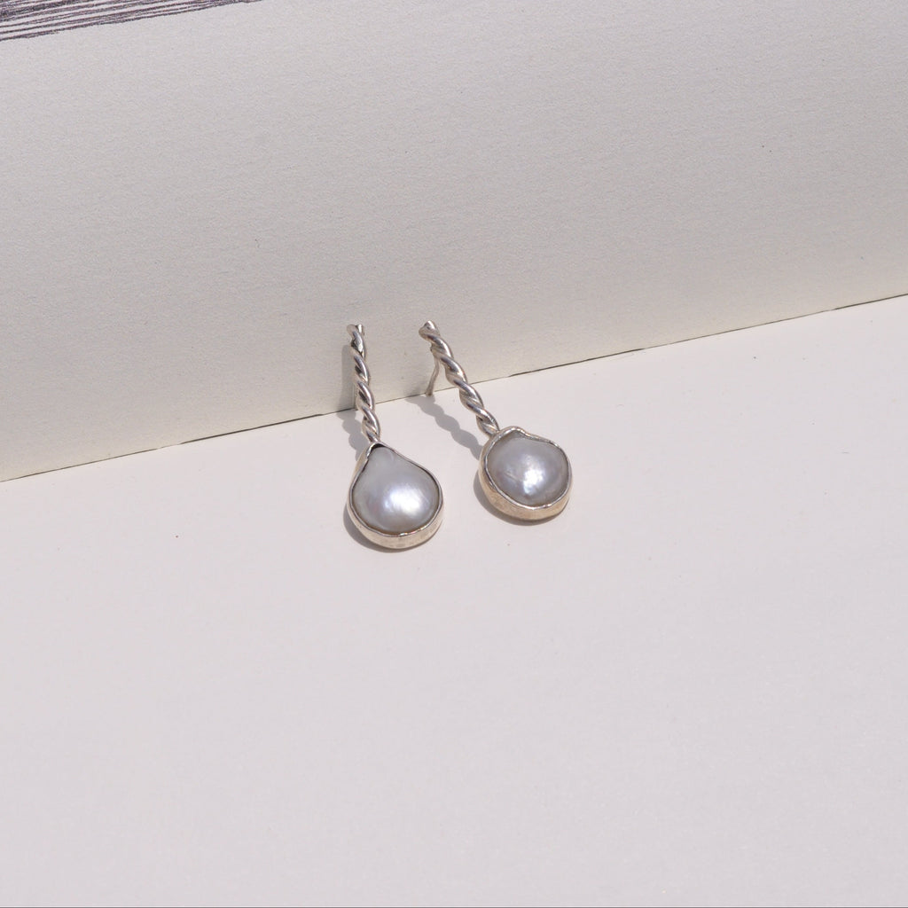 Aretes perla