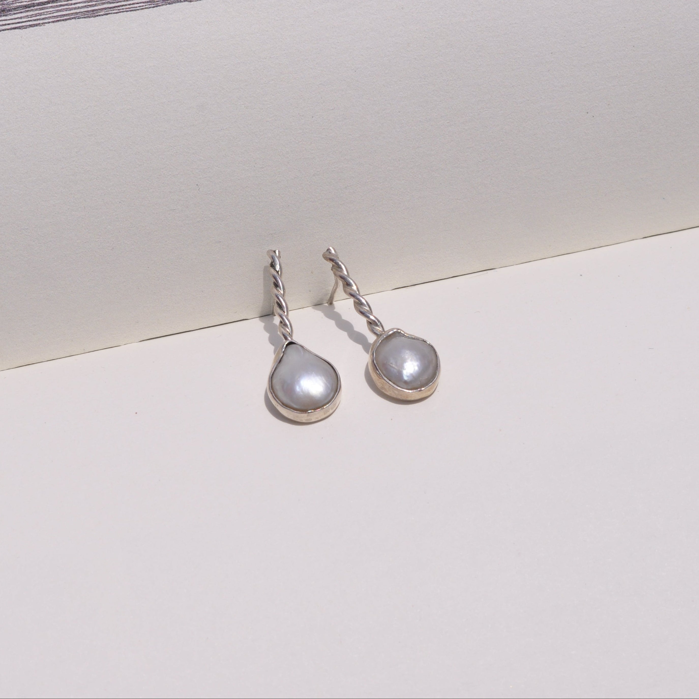 Aretes perla