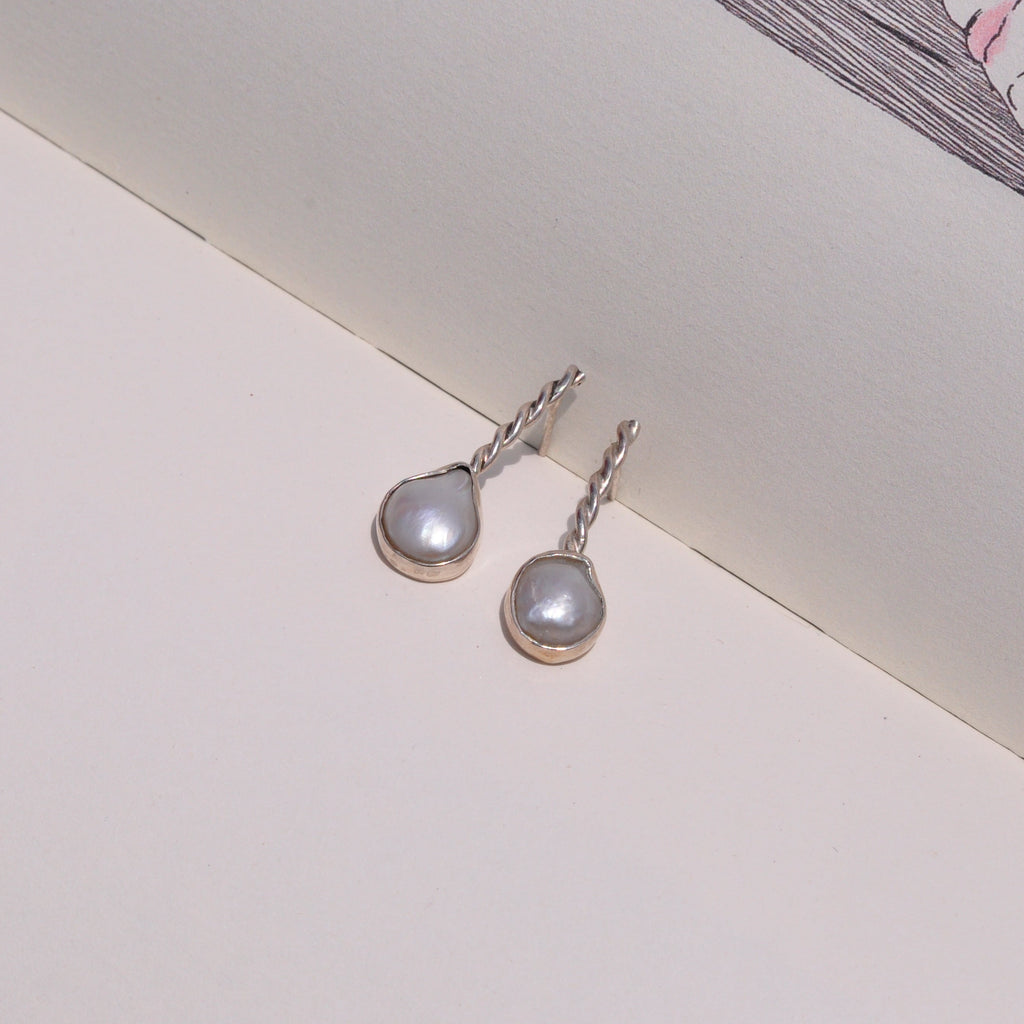 Aretes perla